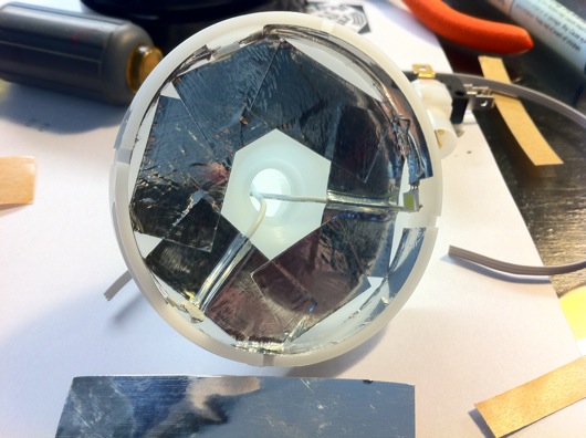 Dome button lined with sticky foil