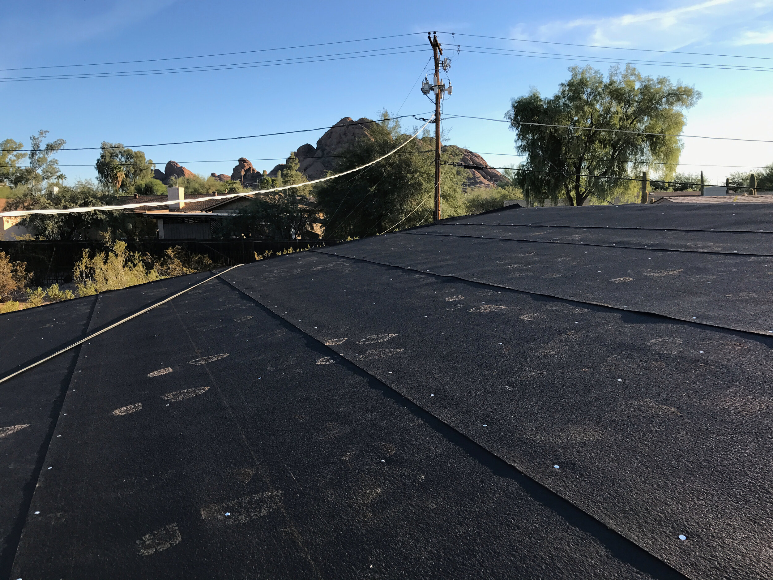 Roofing felt, footprints, nails, cable/telephone line (nice add, and eventually buried along with the power, which was only 2’ above the corner of the roof)